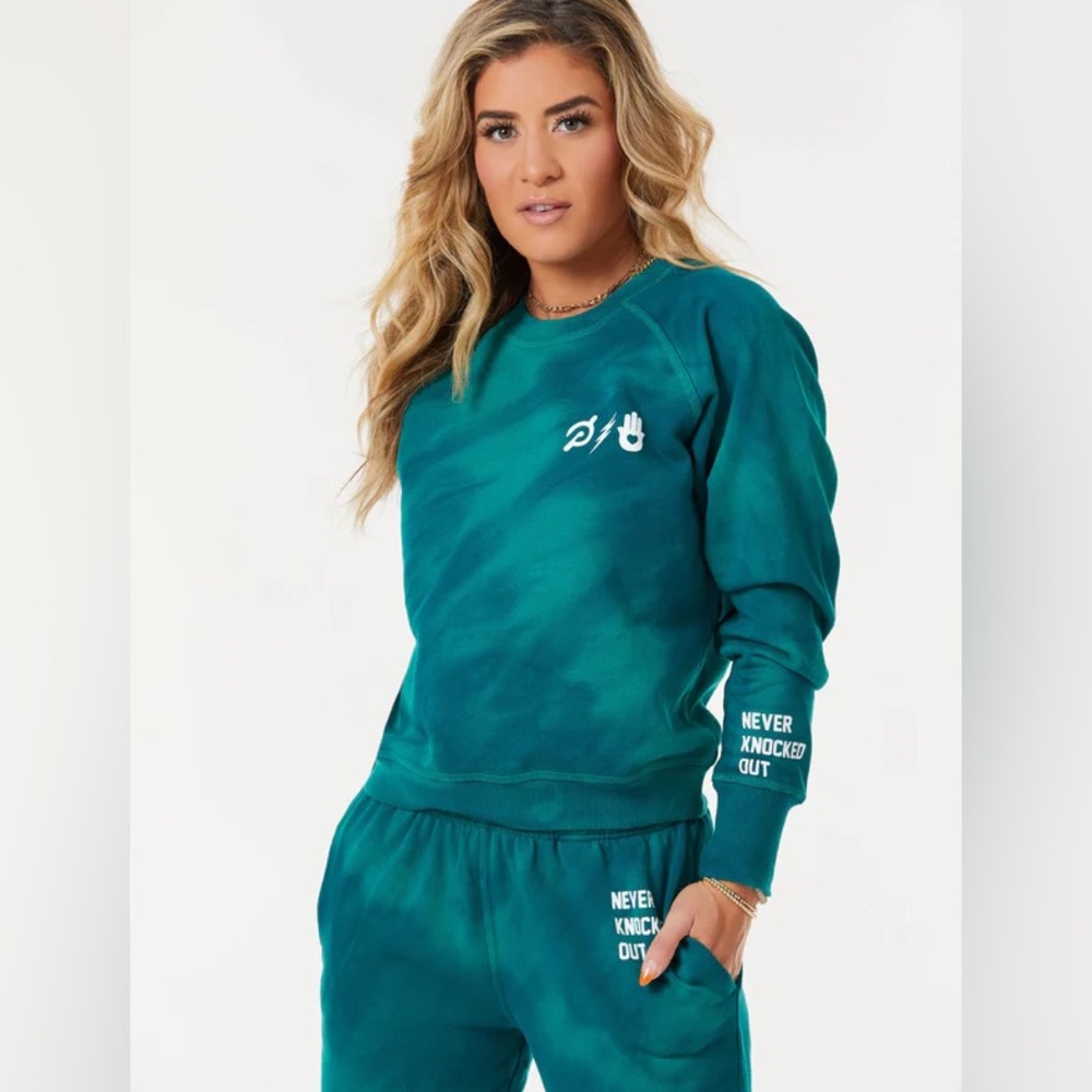 NWOT PELOTON X SPIRITUAL GANGSTER NEVER KNOCKED OUT TIE-DYE RAGLAN PULLOVER